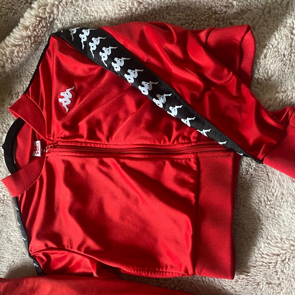 Red Kappa Tracksuit. Small matching outfit.with top and bottom and lightly worn